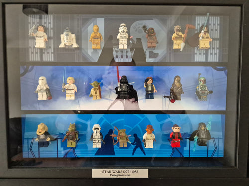 Collection of Star Wars mini figures displayed in a framed case with a blue background.